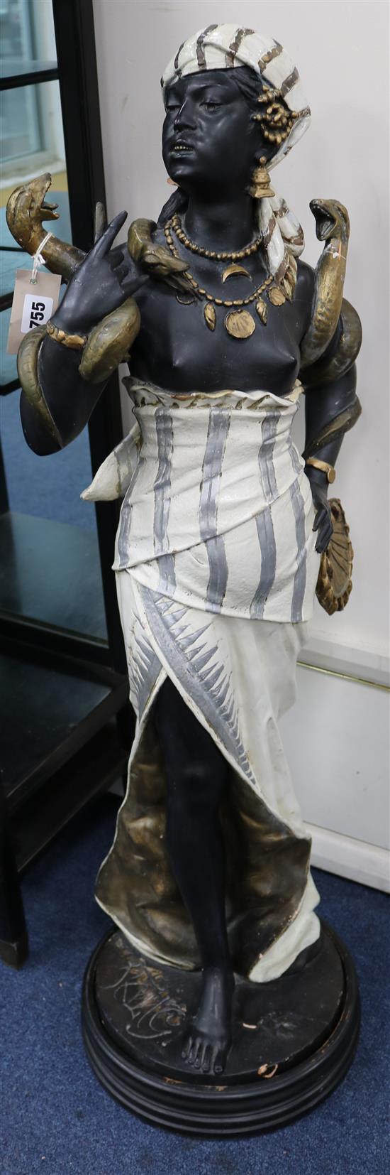 An Egyptian painted giltwood figure H.100cm